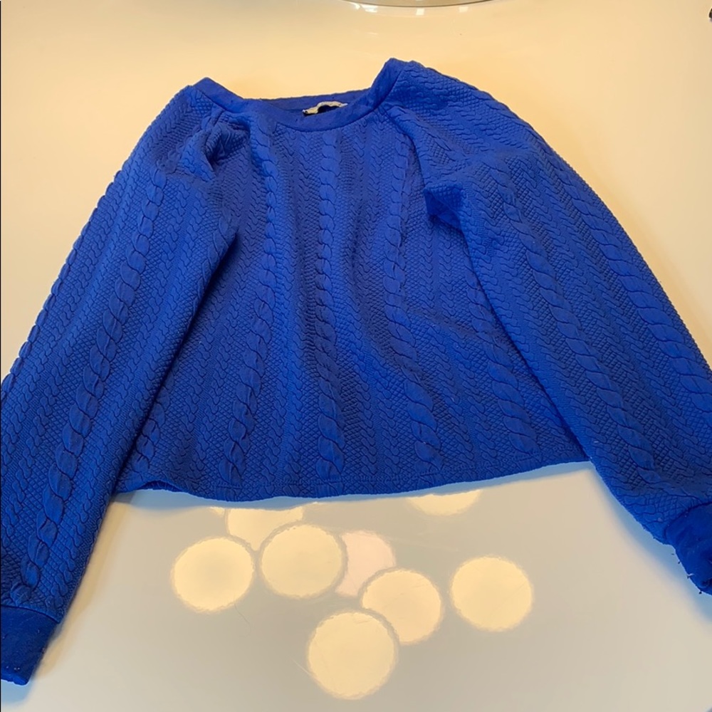 Khloe Kardashian’s Blue sweater